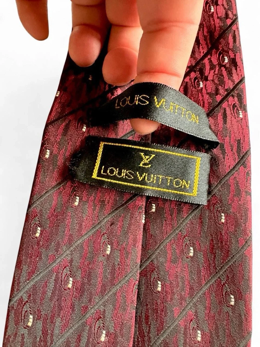 Vintage Louis Vuitton burgundy tie with diagonal stripes and small white dots